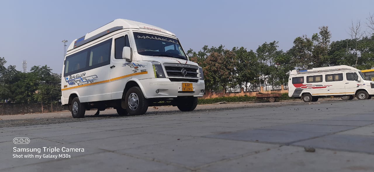 14 seater bus hire in Ahmedabad